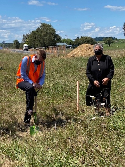 Powerco CEO James Kilty turning soil over as a blessing to mark the start of construction.