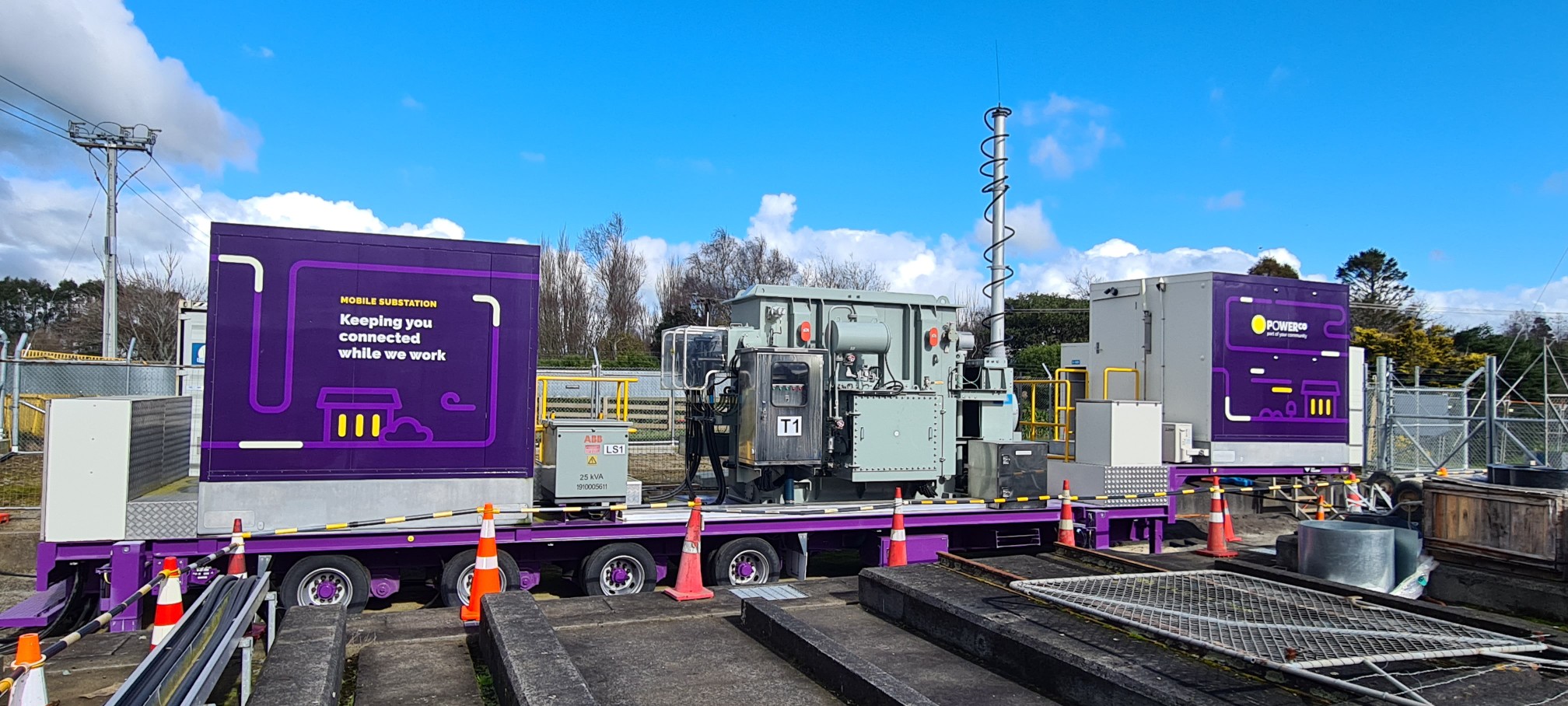 A much smaller version of an electricity substation on wheels that can be transported around.