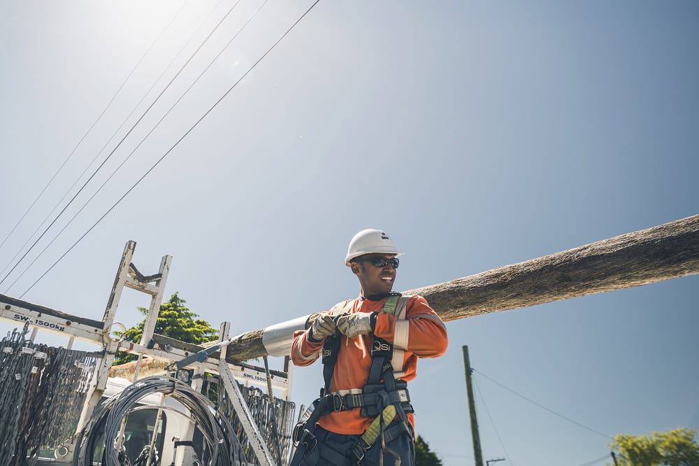 Crewman with power pole in Greytown