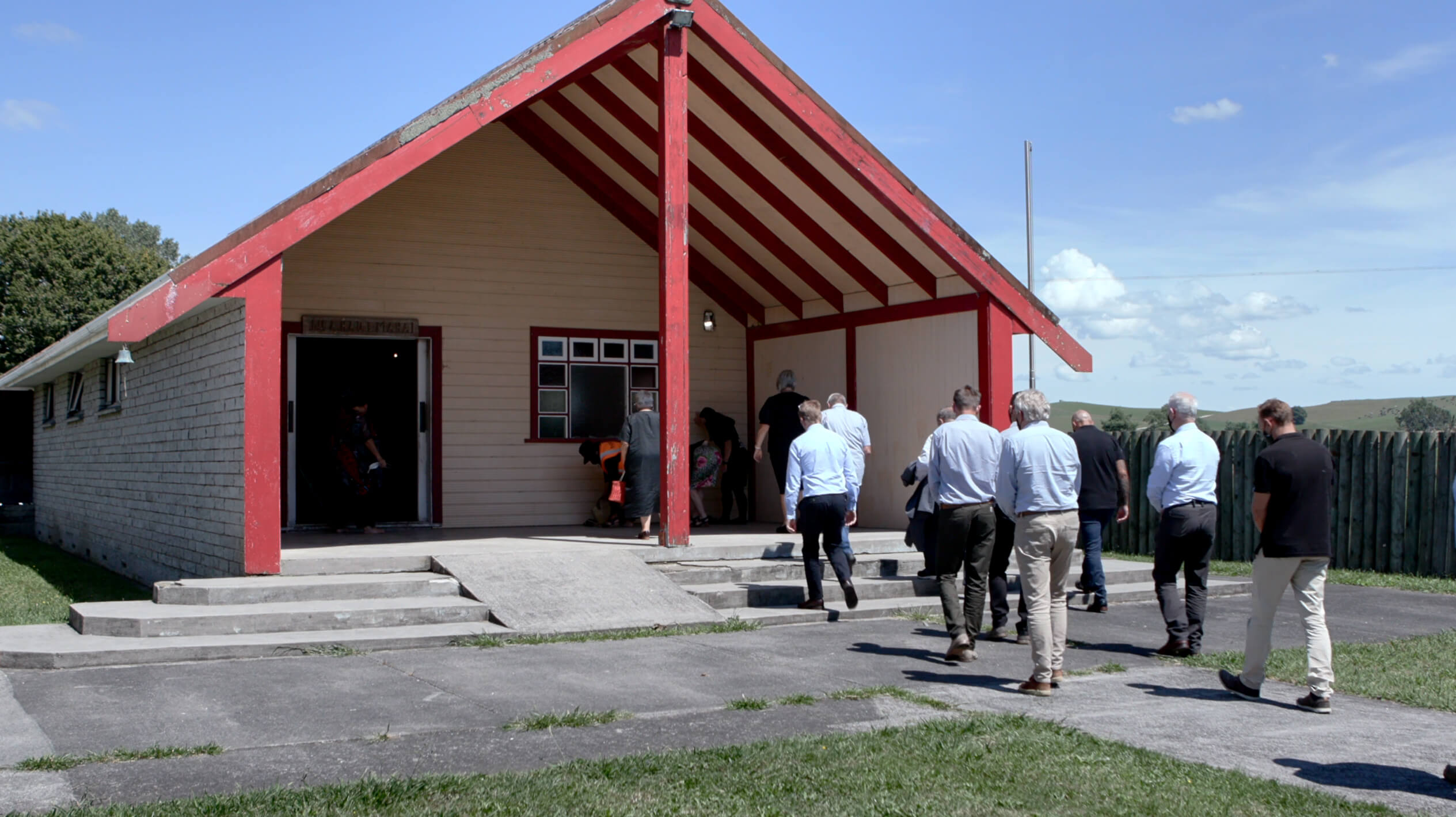 Group walking into a marae