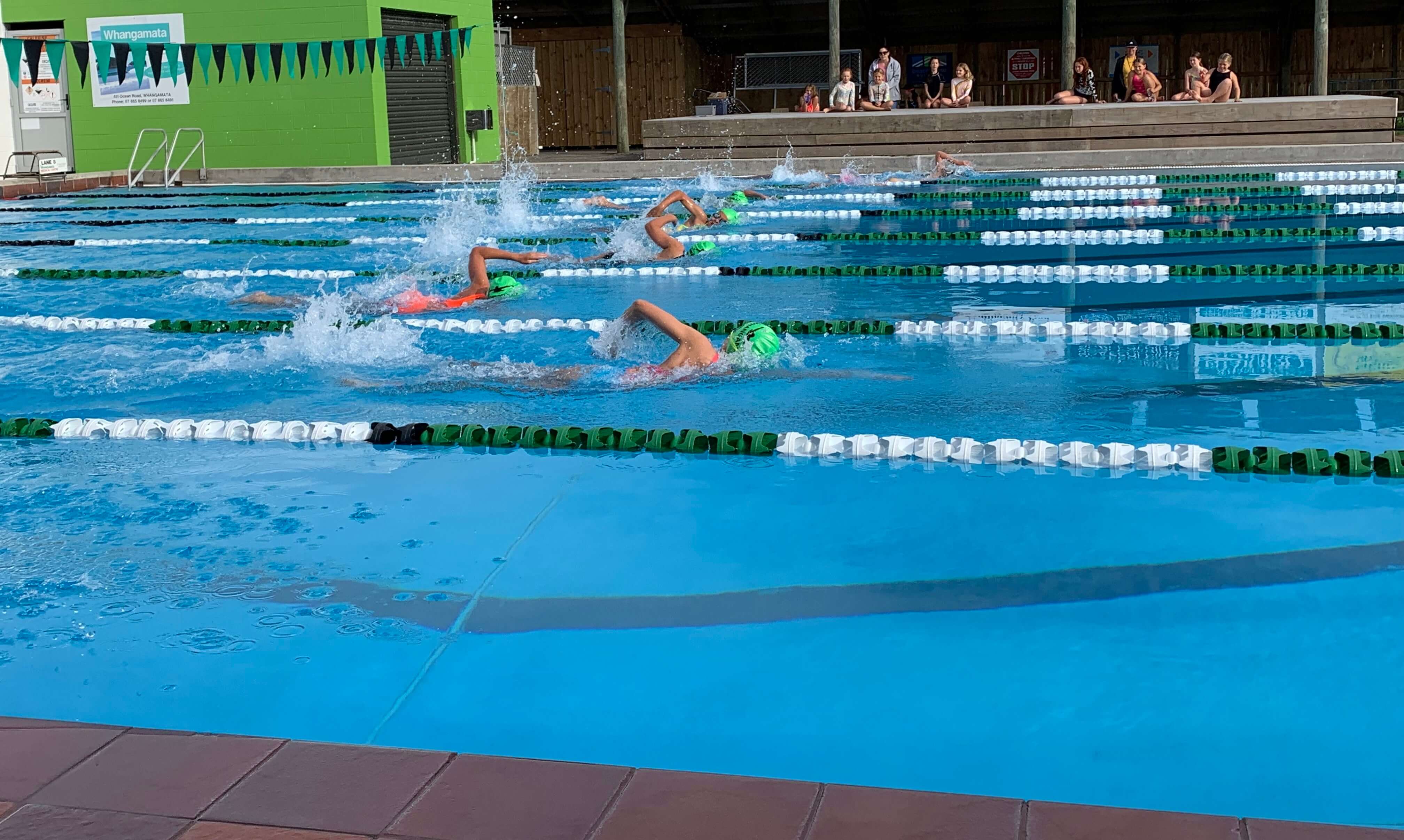 Swimmers using Whangamata Community Swimming Pool