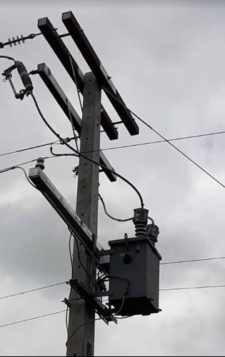 Overhead line cross-arm with a falcon cover