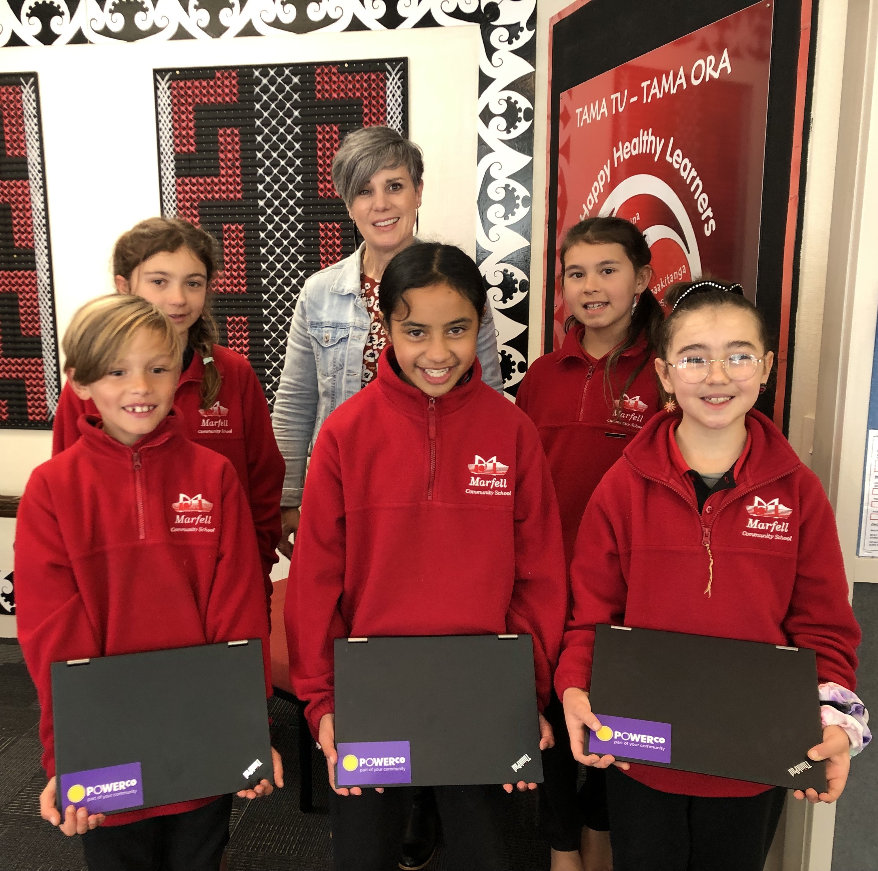 Marfell Primary school students with new laptops