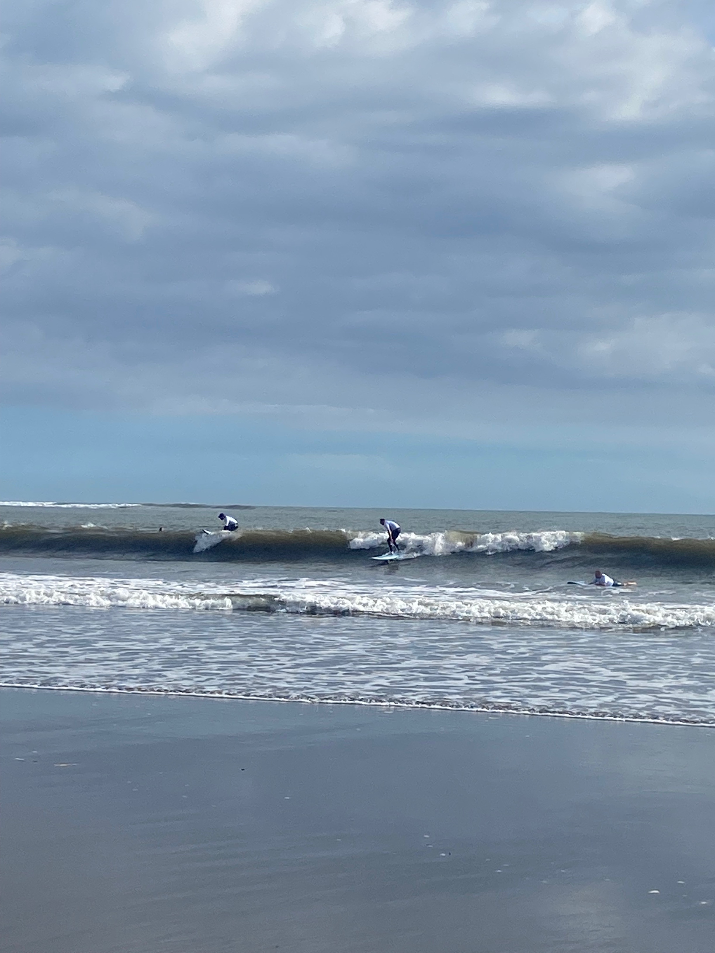 People surfing in the ocean.