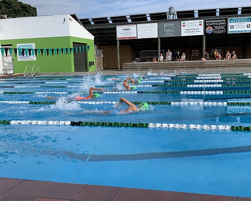 Swimmers using the Whangamata Community Swimming Pool