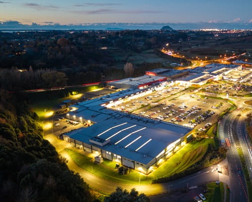 Aerial image of a Tauranga industrial business at night with lights