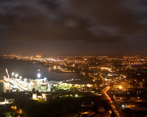 Night scene of city lights over New Plymouth, New Zealand