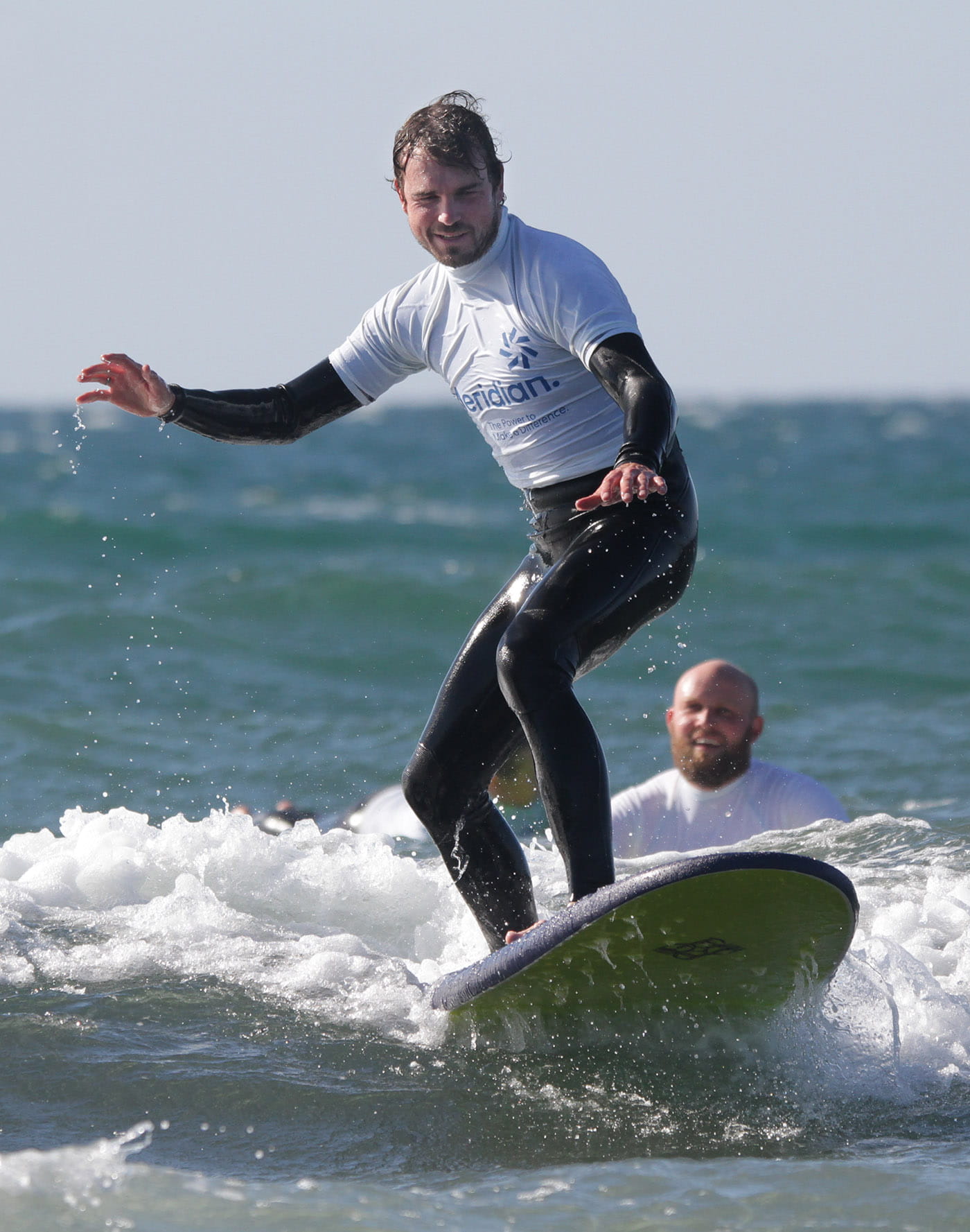 farmer catching a wave surfing