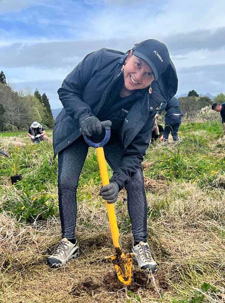 Dot Harris from Powerco planting trees
