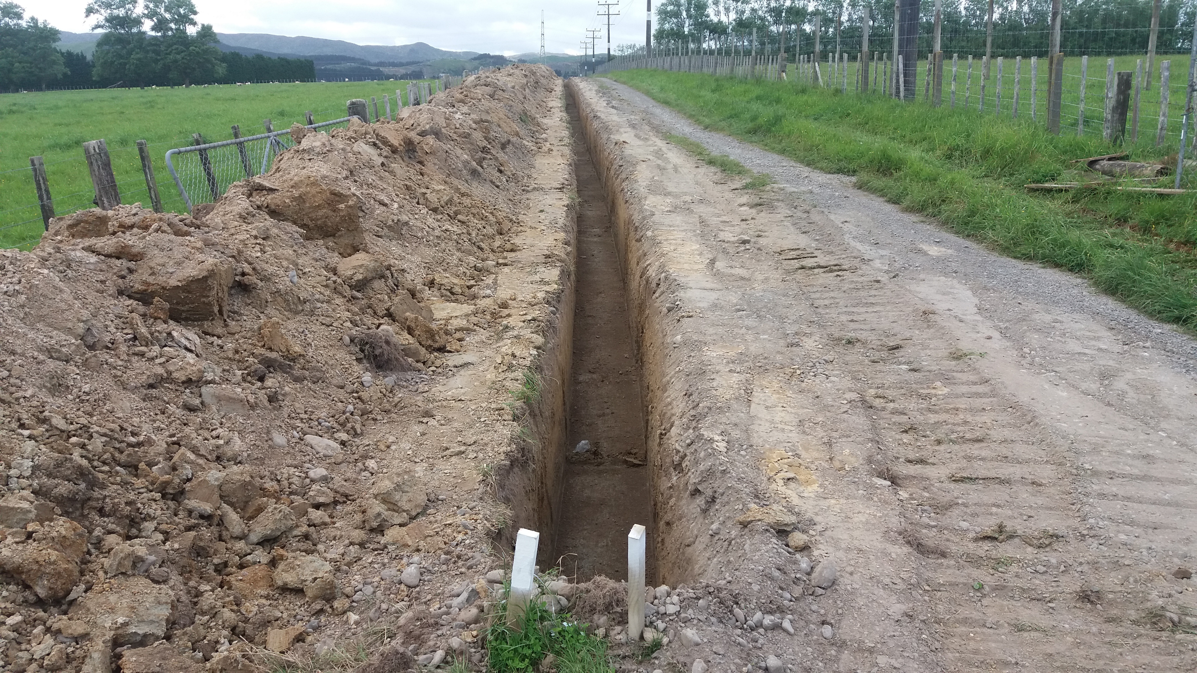 Beginning of trenching for underground cables at Haurongo Farm, Massey University.