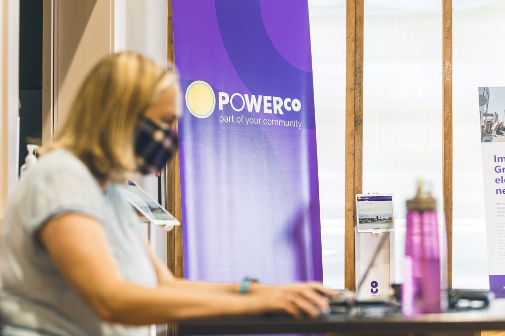 Woman on laptop at Greytown community hub