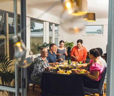 family and friends having dinner